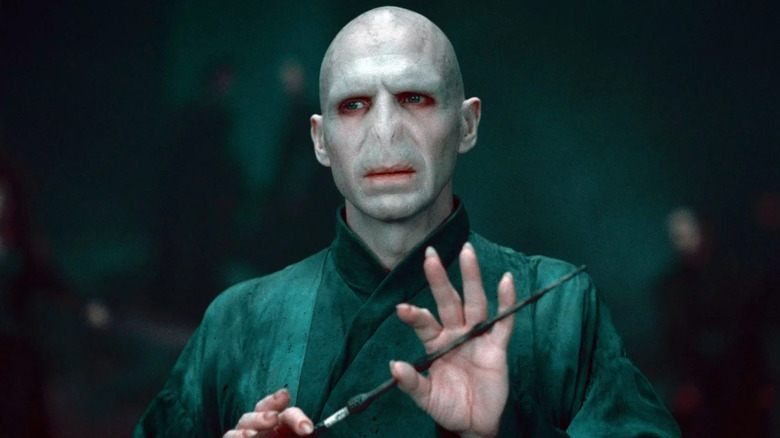 Voldemort caressing the Elder Wand