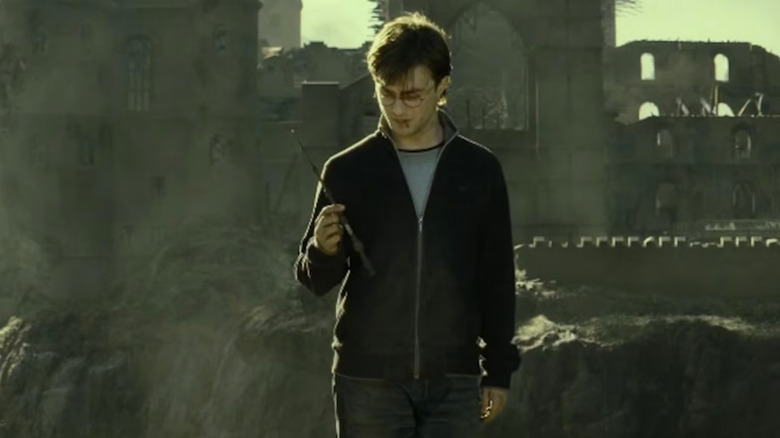 Harry Potter holding the Elder Wand in Harry Potter and the Deathly Hallows — Part 2