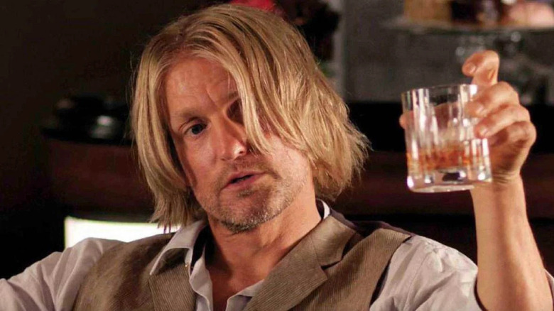 Haymitch holding drink