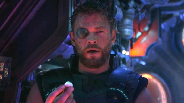 Thor holding an eye