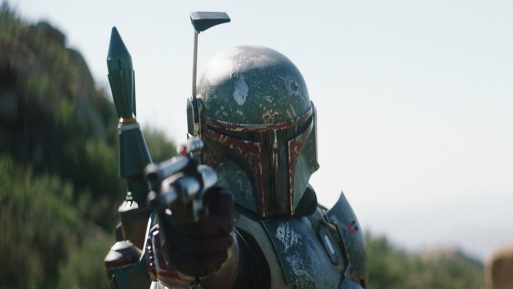 Boba Fett draws his weapon on The Mandalorian