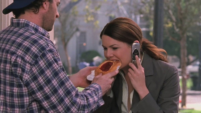 Lorelai eating danish on phone