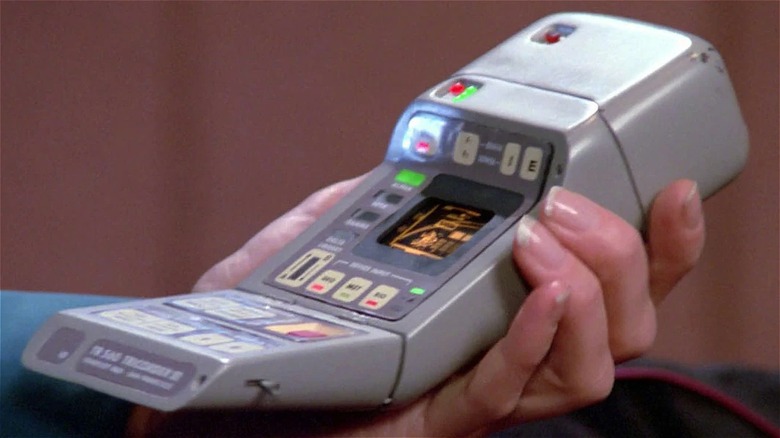 Had holding a tricorder