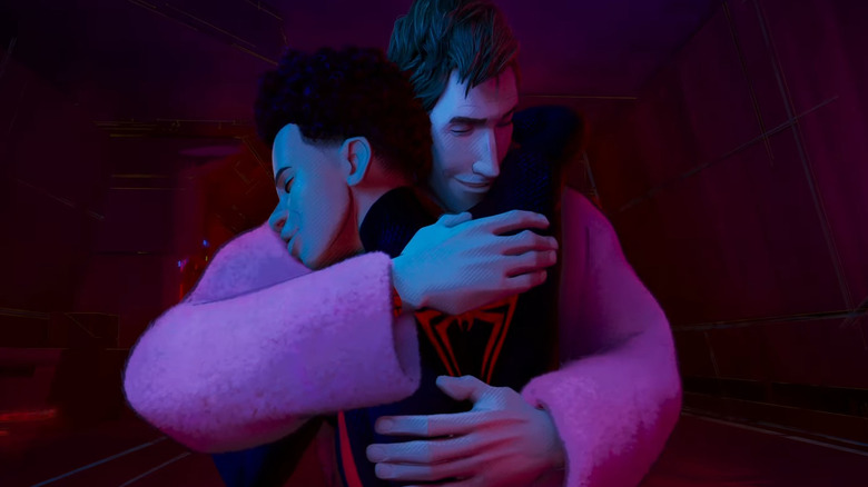 Miles Morales and Peter B. Parker hugging