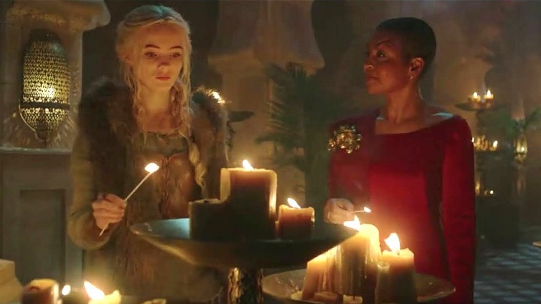 Ciri and Nenneke lighting candles