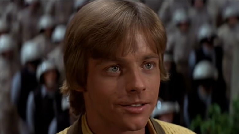 Mark Hamill as Luke Skywalker in Star Wars: A New Hope receiving medal