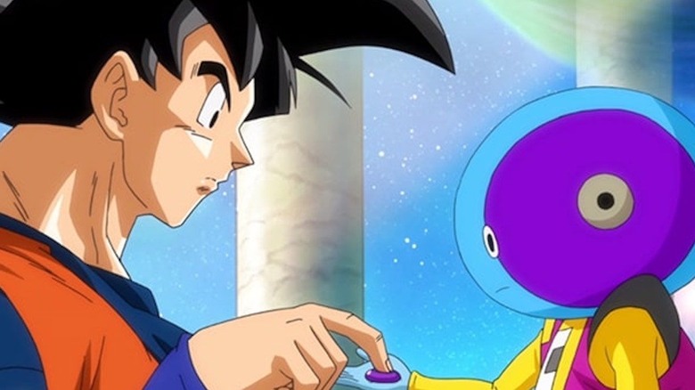 Goku pressing Zeno's Button