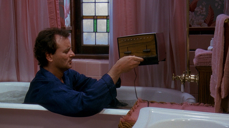 Bill Murray holding toaster in Groundhog Day bath scene