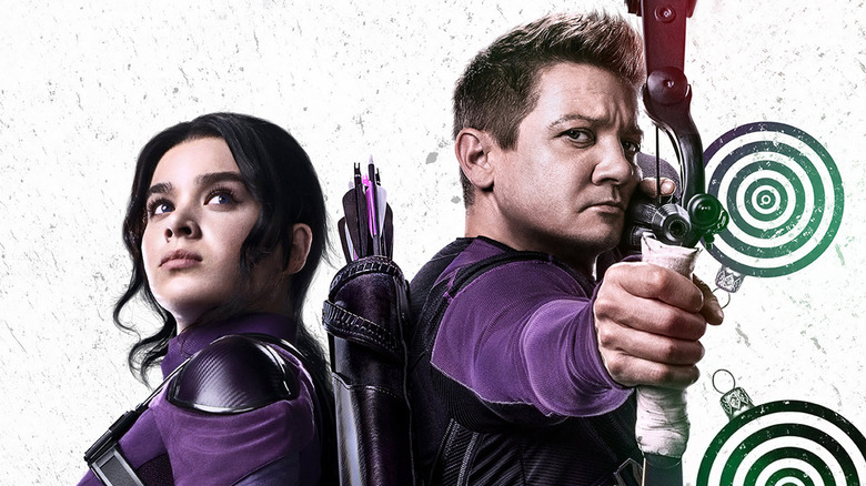 Kate Bishop and Hawkeye stand back to back