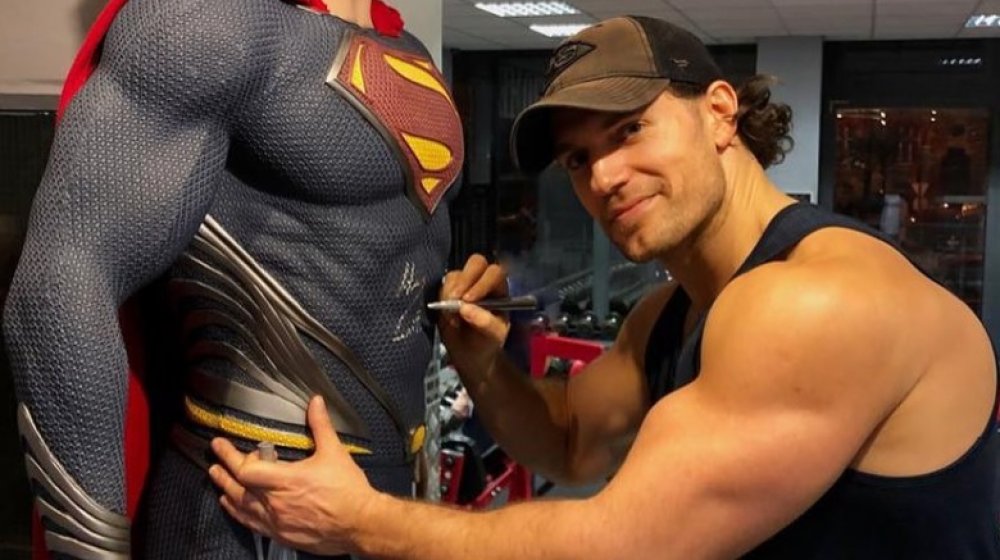 Henry Cavill signs Superman statue at Flex Gym