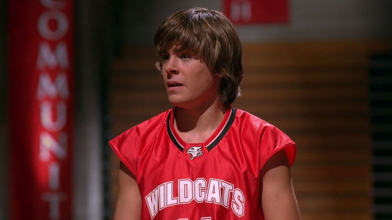 Troy wearing basketball jersey 