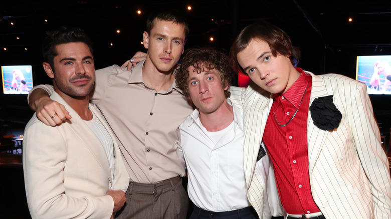 Zac Efron, Harris Dickinson, Jeremy Allen White and Stanley Simons posing