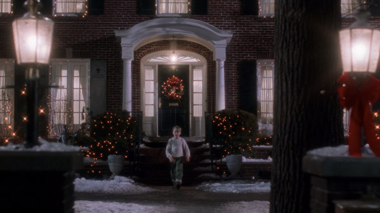 Kevin McCallister walking in front of house at night