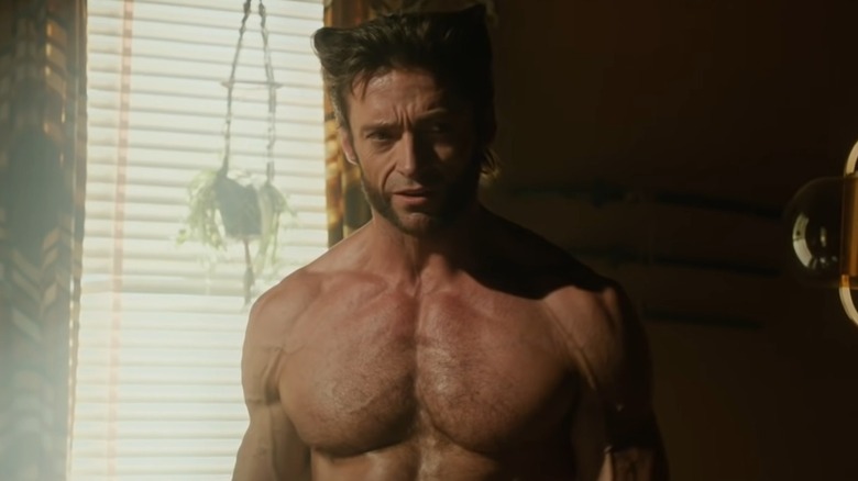 Shirtless Wolverine staring