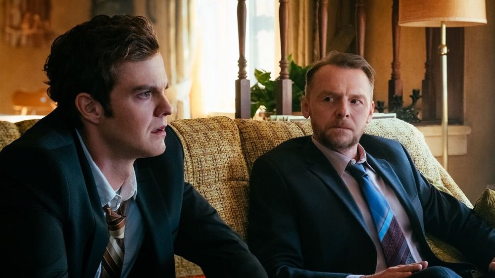 Hughie (Jack Quaid) and Hugh (Simon Pegg) talk on The Boys