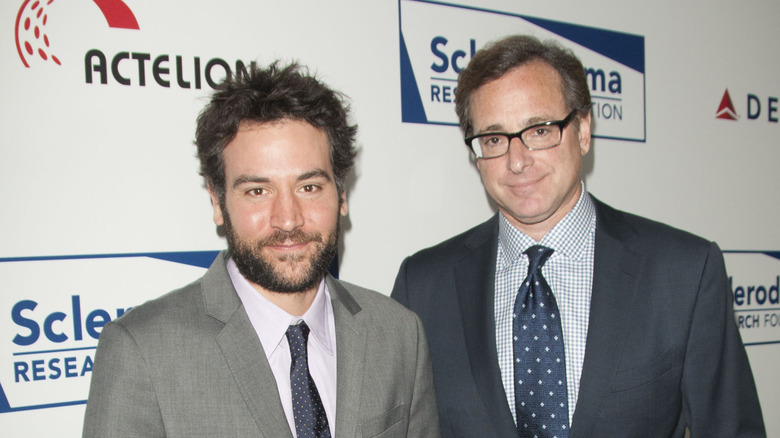 Josh Radnor smiling with Bob Saget