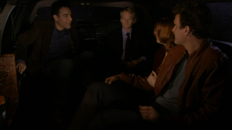 The gang talking in the limo