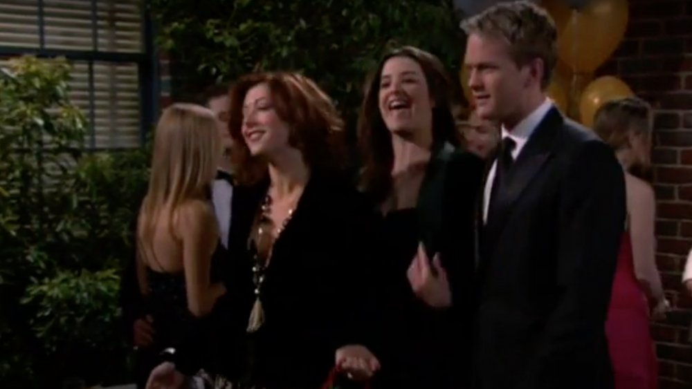 Alyson Hannigan as Lily Aldrin, Cobie Smulders as Robin Scherbatsky, and Neil Patrick Harris as Barney Stinson in How I Met Your Mother