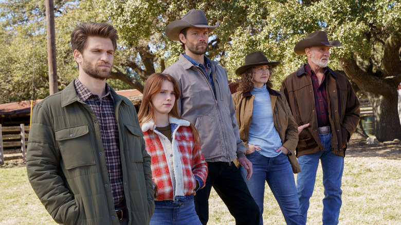 The Walker family standing outside