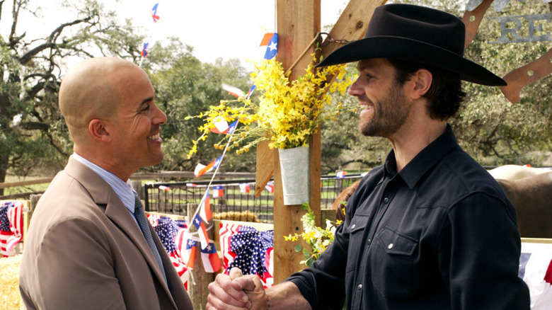 Captain James and Cordell Walker shaking hands