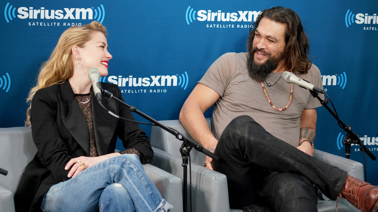 Amber Heard and Jason Momoa laugh during interview