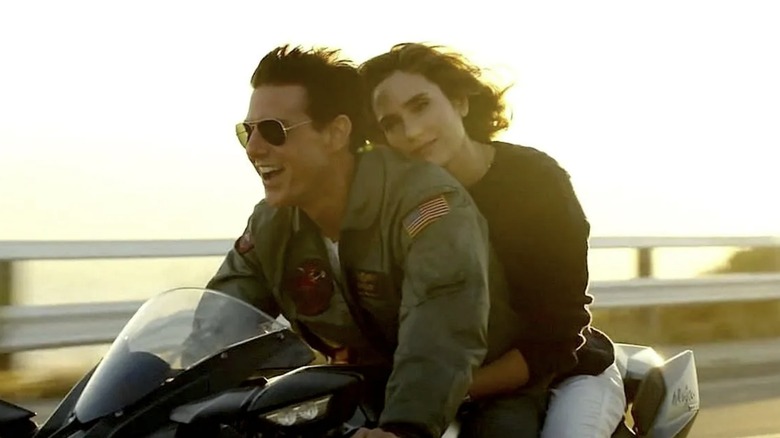 Maverick and Penny on bike in "Top Gun" still