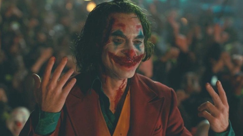 Joker standing in crowd