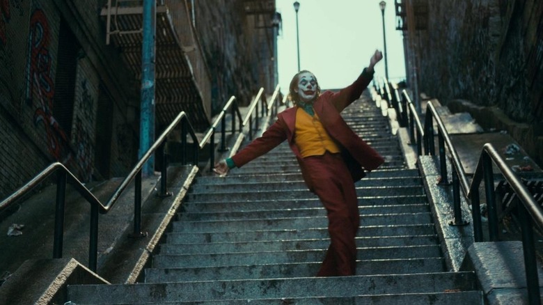 Joker dancing on stairs