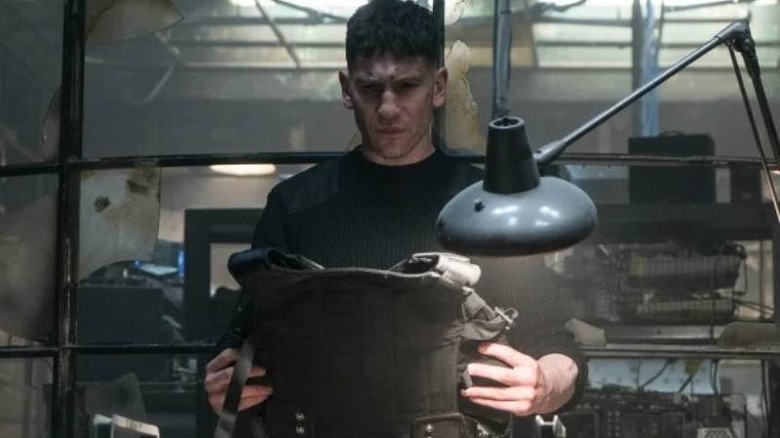 Punisher looking at vest