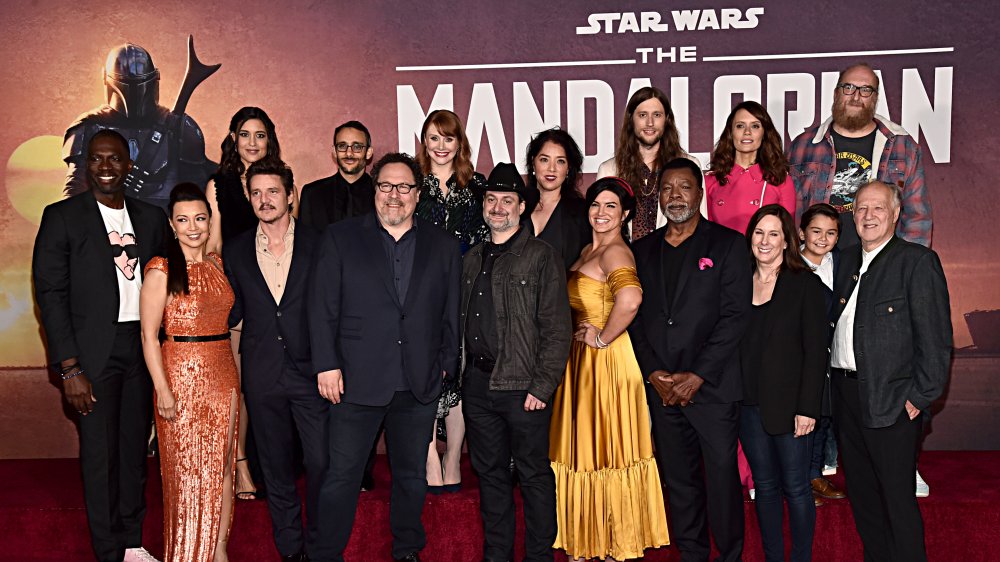 Jon Favreau with the Mandalorian cast and crew at the premiere