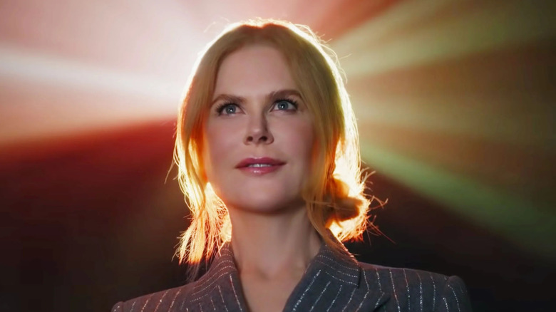 Nicole Kidman backlit by a theater projector in an ad for AMC Theatres