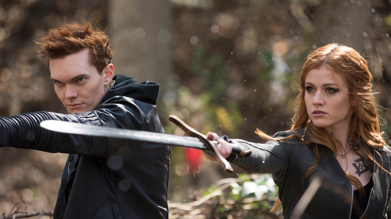 Clary and Jonathan with swords