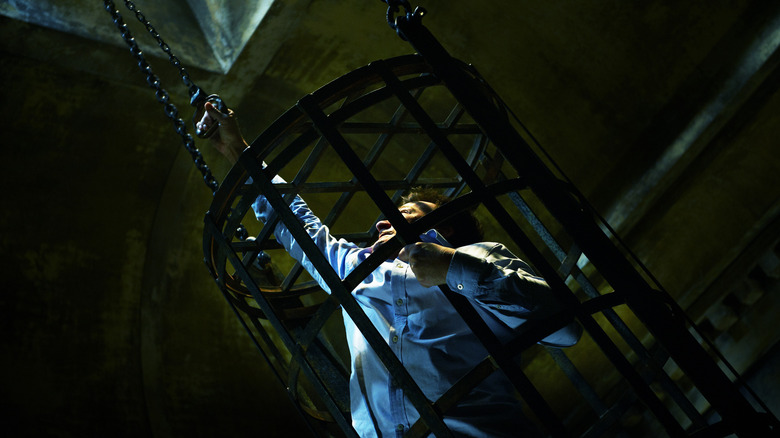 Bobby reaches for freedom in "Saw 3D" (2010)