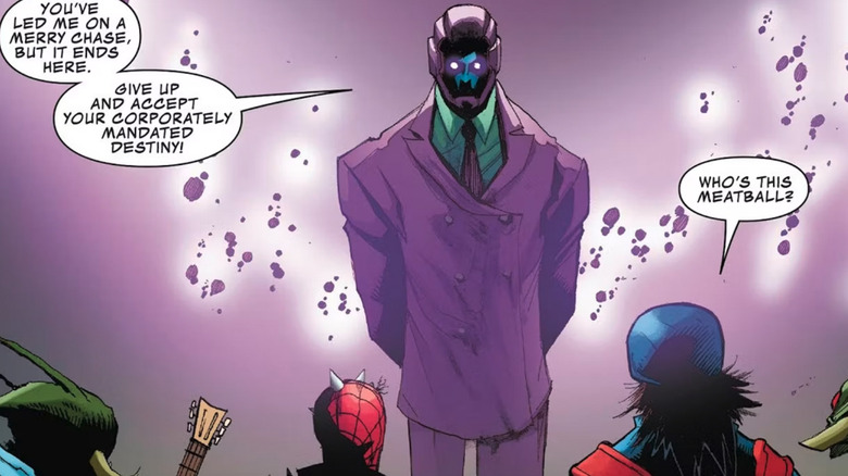 Kang in a purple suit