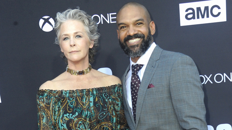 Melissa McBride and Khary Payton at an event