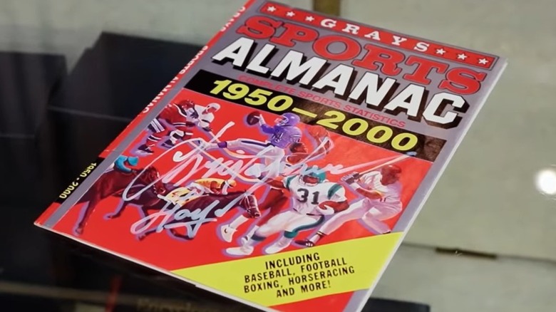 A signed Grays Sports Almanac