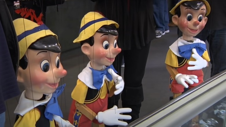 Three Pinocchio marionettes