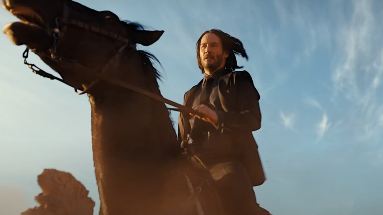 John Wick riding a horse