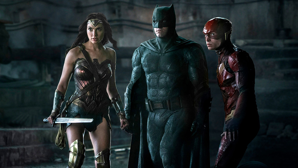 Gal Gadot, Ben Affleck, and Ezra Miller as Wonder Woman, Batman, and the Flash in Justice League