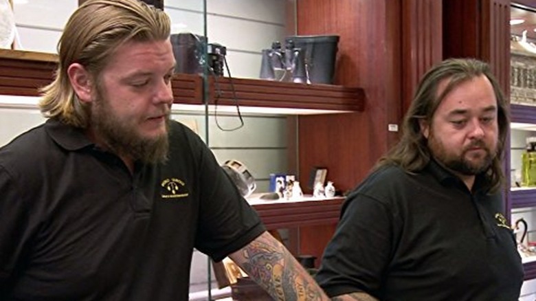 Corey Harrison and Chumlee at a counter