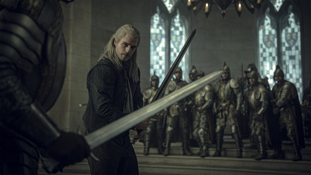 Geralt in a sword fight in Netflix's The Witcher