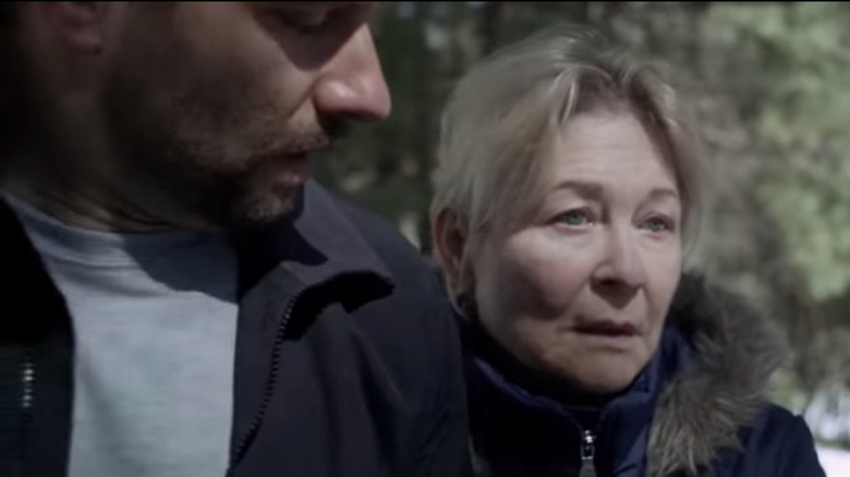 Jack Coyle walking in the woods with his mother in Nix