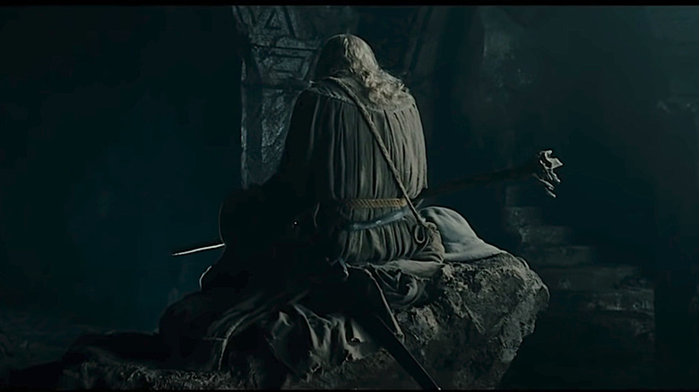 Gandalf sitting on a rock