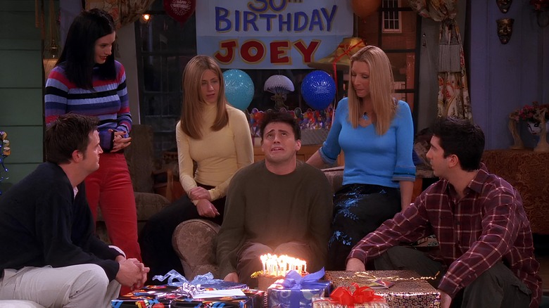 Joey looking sad with friends