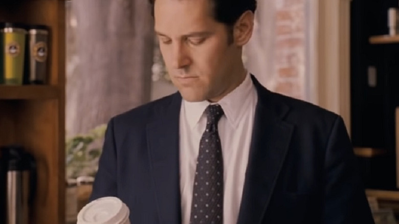 Paul Rudd staring at coffee cup