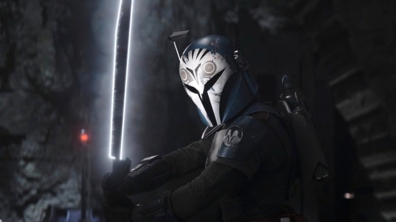 Bo-Katan holding Darksaber