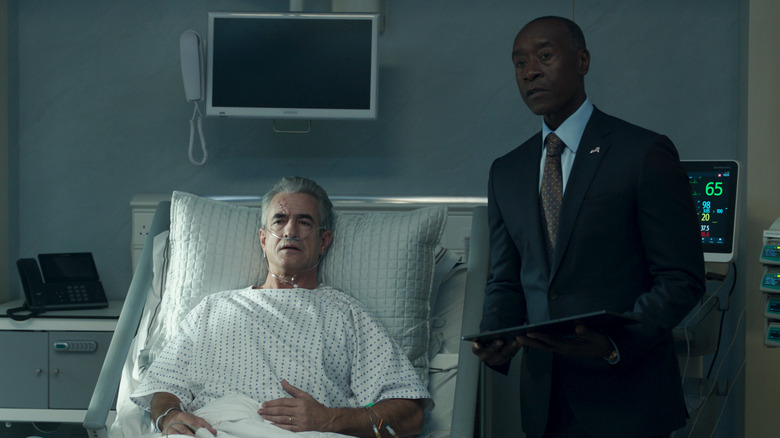 Rhodey next to President in hospital bed