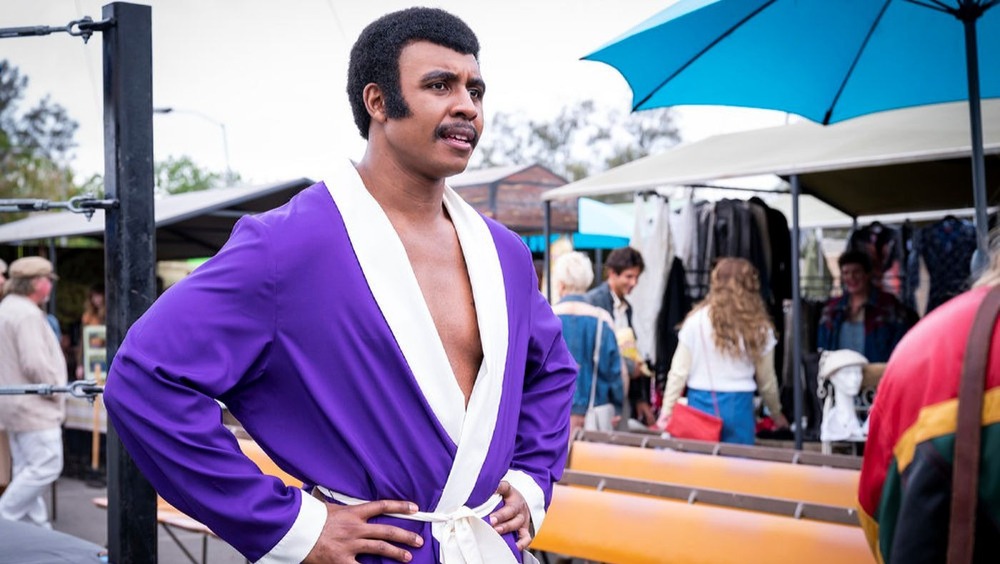 Rocky Johnson in robe