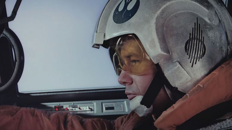 Rebel pilot in helmet stares to left