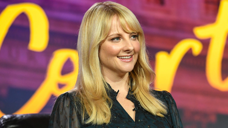 Melissa Rauch smiling during interview